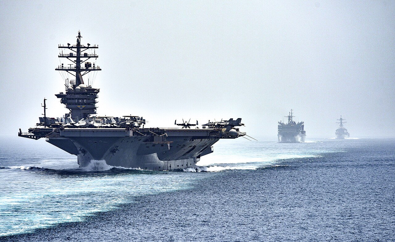 The aircraft carrier USS Dwight D. Eisenhower transits the Strait of Hormuz.