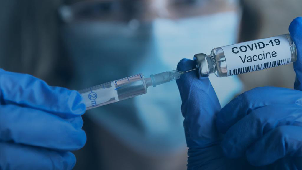 A vaccine vial and syringe.