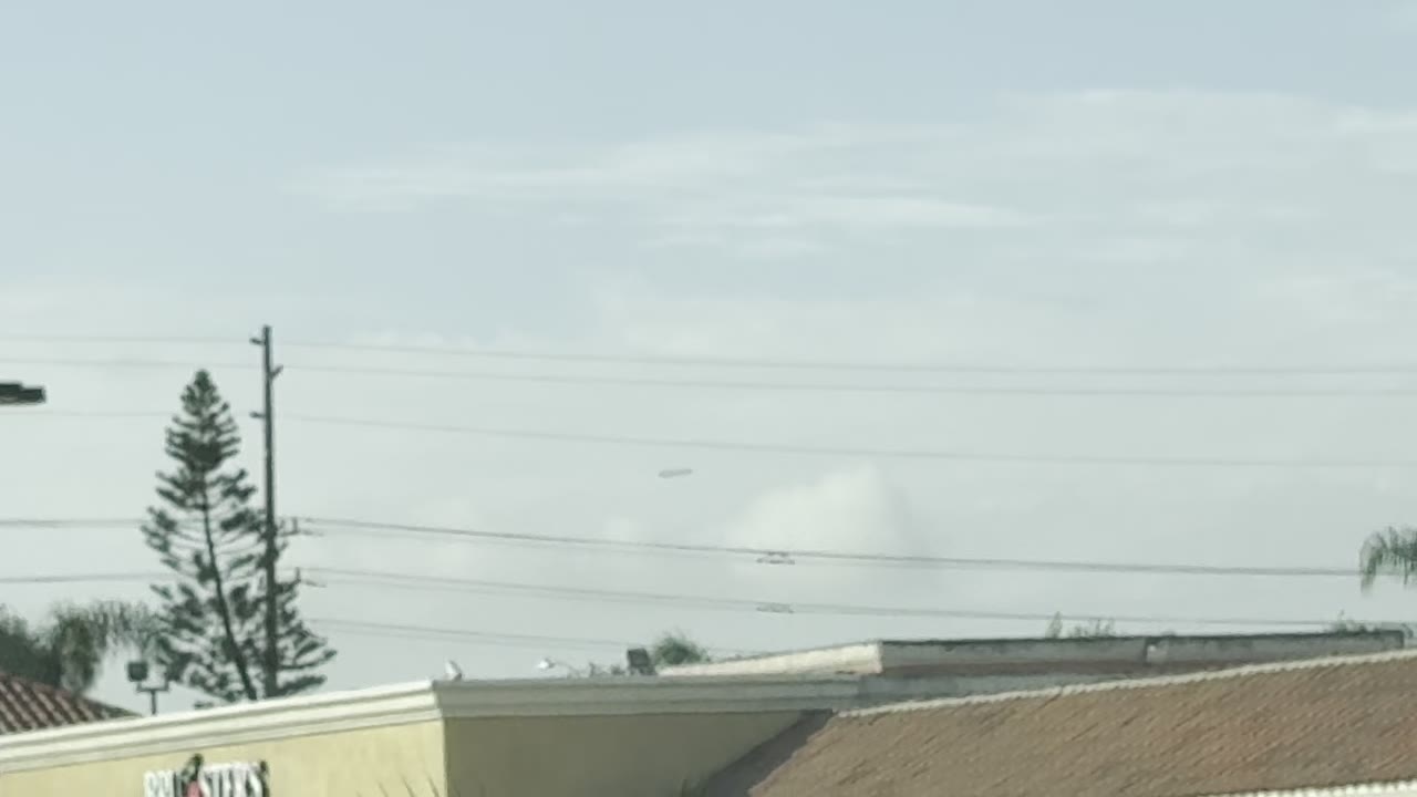 The dark object over the plaza in Cypress, California.