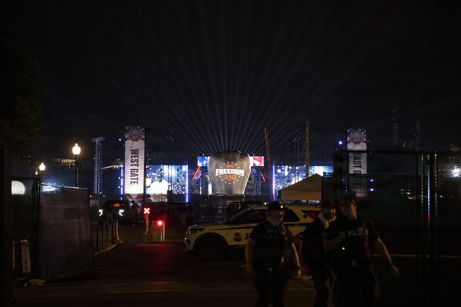 The UFC Octagon lit up at night.